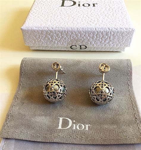 dior silver tribal earrings